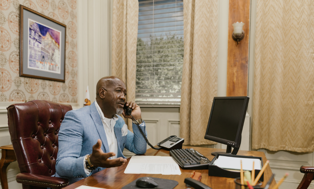 Modern law firm office with legal documents and laptop on desk